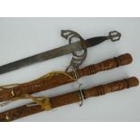 A Spanish Toledo El Cid medieval style sword and two Thai dha carved wood swords