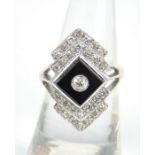 18ct white gold diamond and onyx Art Deco cocktail ring with central set diamond.