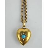 An Edwardian 15ct gold heart pendant and 9ct gold belcher chain