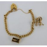 9ct gold chain link bracelet and charms - 16.4 grams