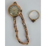 A 9ct gold ladies wrist watch & bracelet and a garnet set 9ct gold ring