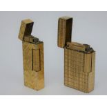 A vintage gold plated Dunhill Rollagas cigarette lighter and a Dupont gold plated lighter