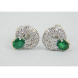 Pair of 18ct white gold, diamond and emerald earrings