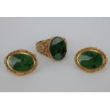 A 1970 9ct gold and jade gentleman's ring and similar pair of 9ct gold cufflinks