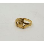 An 18ct. gold Claddagh ring, size UK T. (5.5g)