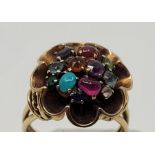 A 9ct. gold and multi-colour mixed gemstone set flower form cluster ring, set various mixed round