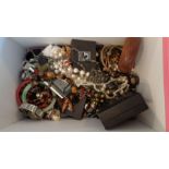 A box full of costume jewellery to include wristwatches, earrings, necklaces and other items of