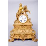 H Rochat of Paris gilded French mantel clock with two train, spring driven movement striking on a