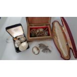 A selection of sterling silver and costume jewellery comprising lockets, brooches, pearls and