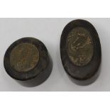 A Japanese horn and tortoiseshell oval box and cover with applied decoration, 10cm wide and a