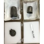 Two silver thimbles and a silver pin-head, 17th Century large silver thimble approximately 3cm