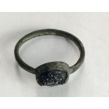 Medieval copper and blue glass ring, 1.5cm international diameter.