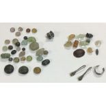 Collection of Ancient Greek and Roman Glass Beads with silver earrings and ring and glass gaming