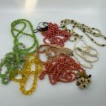 Vintage necklaces C1920s and later  to include facet cut and smooth beads in plastic, glass and bone