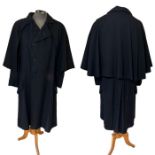 An early 20th century carriage or coachman's coat, men's large. (1) some moth damage, mostly to