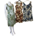 four vintage dresses to include 1 50s/60s in a green rose motif brocade with twinkling iridescent