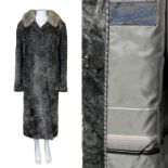 A longer length silver grey astrakhan / curly lamb coat with silver mink collar. striped silver