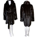 A Blackglama dark ranch mink belted jacket/ three quarter length coat, numbered label,  from John