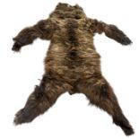 1920s taxidermy wolf skin and brown bear skin rugs (2) *****please note that due to export