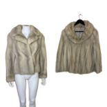 2 silver saphire cross mink jackets, one small sized 50s/60s with split cuffs and a damask lining