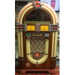 A Wurlitzer 1015 - CD jukebox, with coin select of 30p, 50p & £1 in the original 1920s design,