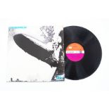 Led Zeppelin First LP Record Plum and Orange original Turquoise Text with Grey `landing` strip at