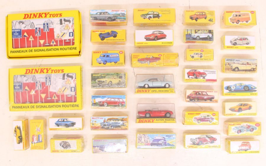 Atlas: A collection of over 30 boxed modern Atlas Dinky Toys vehicles. Mostly still sealed. Please