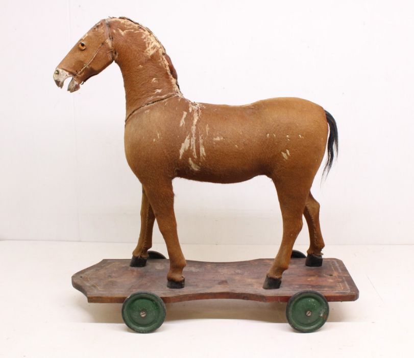 Horse: An early 20th century horse, with pony skin and horse hair, glass inset eyes, mane lacking, - Image 2 of 5