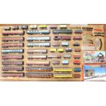Model Railway: A collection of assorted unboxed OO Gauge, coaches and rolling stock to include: