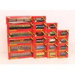 Hornby: A collection of assorted boxed Hornby OO Gauge coaches and rolling stock. Twenty-one varying