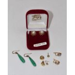 Four pairs of earrings including malachite drops in yellow metal, a pair of pearl earrings, a pair