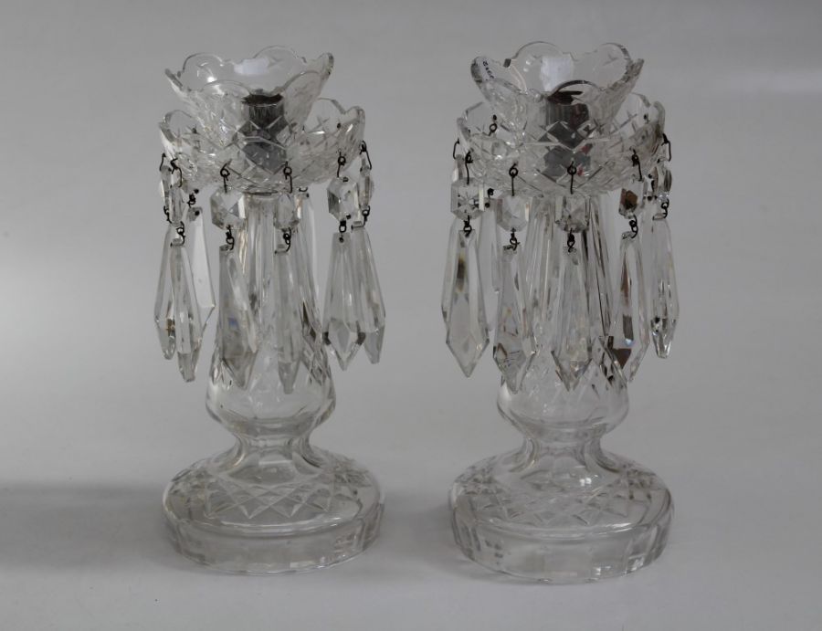 A pair of 20th century cut and moulded clear glass table lustres each with facet cut icicle drops,