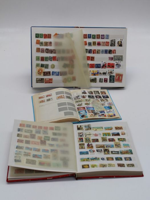 Stamps. World range in two stockbooks and juvenile GB album including Australia Roos to South