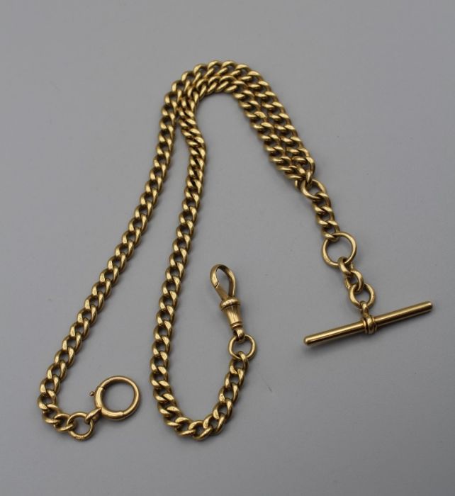An 18 carat gold doublle Albert with T bar and individually marked chain links. Gross weight 56gm,