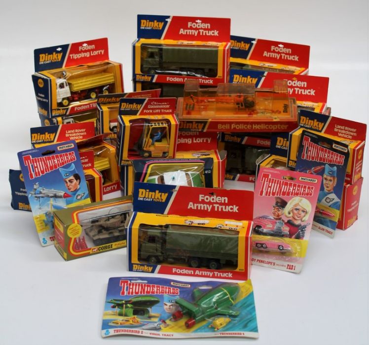 A large selection of Dinky boxed vehicles to include various army transport, breakdown vehicles,