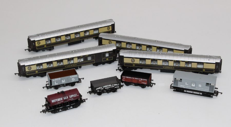 A collection of Rolling stock to include five x Pullman coaches ( Hornby) and seven x goods wagons (