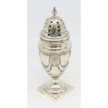 A late 19th Century Neo-Classical style large silver caster, hallmarked Hawksworth Eyre & Co.,