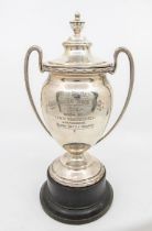 A George V silver two handled presentation trophy, detachable lid to top and crimped pie crust
