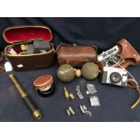 A collectors lot to include; A leather cased set of two bowls and a jack, a cased Feature