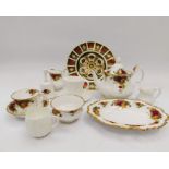 A Royal Albert Old Country Roses tea service, together with Royal Crown Derby Posies plates, Royal