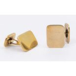 A pair of 14ct gold cufflinks, comprising plain polished rectangular links with swivel fitting,