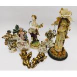 A collection of mainly early 20th Century German figures, bowls and a clock