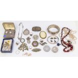 A collection of costume jewellery to include Victorian silver brooches, silver crown dated 1887,