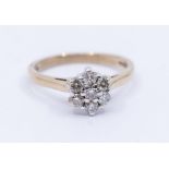 A diamond and 9ct gold flower cluster ring, setting approx 7mm, size N, total gross weight approx