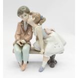 Lladro figure of 'Girl kissing Boy'