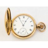 An early 20th century Waltham gold plated hunter pocket watch, signed white enamel dial, Roman