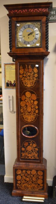 A 20th century reproduction Dutch-style 8-day longcase clock with chime in a mahogany case with