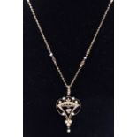 An Edwardian pearl set 15ct gold pendant/brooch, comprising a wire work form inset with a coronet