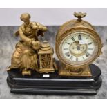 A late 19th century gilt metal American open-face 8-day mantel clock on a wooden stand with Roman