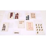 A job  lot of carded buttons, to include: Czech glass of various shapes and designs, plastic pink